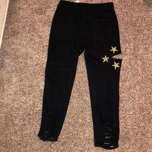 Black Distressed jeans with gold stars on right leg - Picture 2 of 7